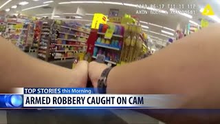 Video Extra: Officer exchanges gunfire with store robbers