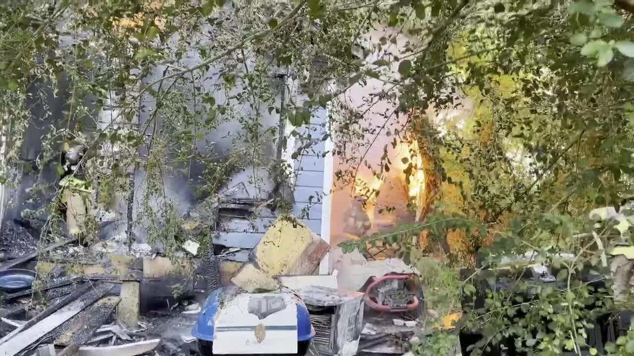 Two people displaced after house fire on Ford St. - YouTube