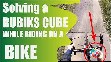 Solving a RUBIKS CUBE While Riding a Bike!!