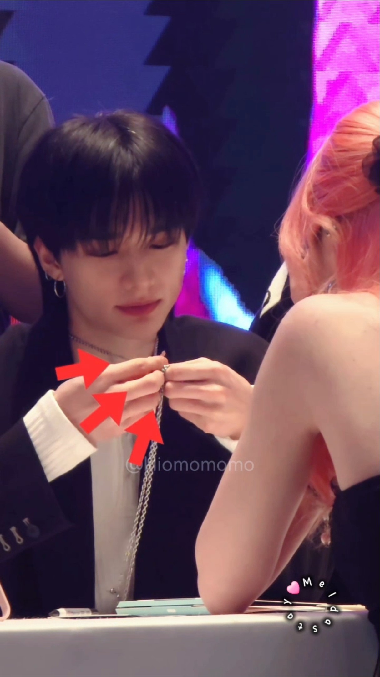 Hyunjin opens the lock on Op's necklace with his key