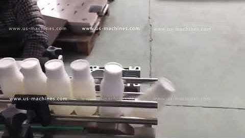 Automatic milk plastic bottle wheel rolling capping machine with cap feeder testing video