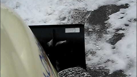 Cub Cadet tractor plowing snow