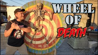 We made a Motorized Axe Throwing Wheel of Death Prop