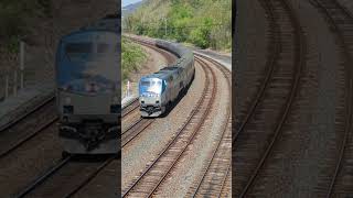 NICE BRIDGE VIEW OF AMTRAK #114 ON AMTRAK 42 AT ROCKVILLE PA.