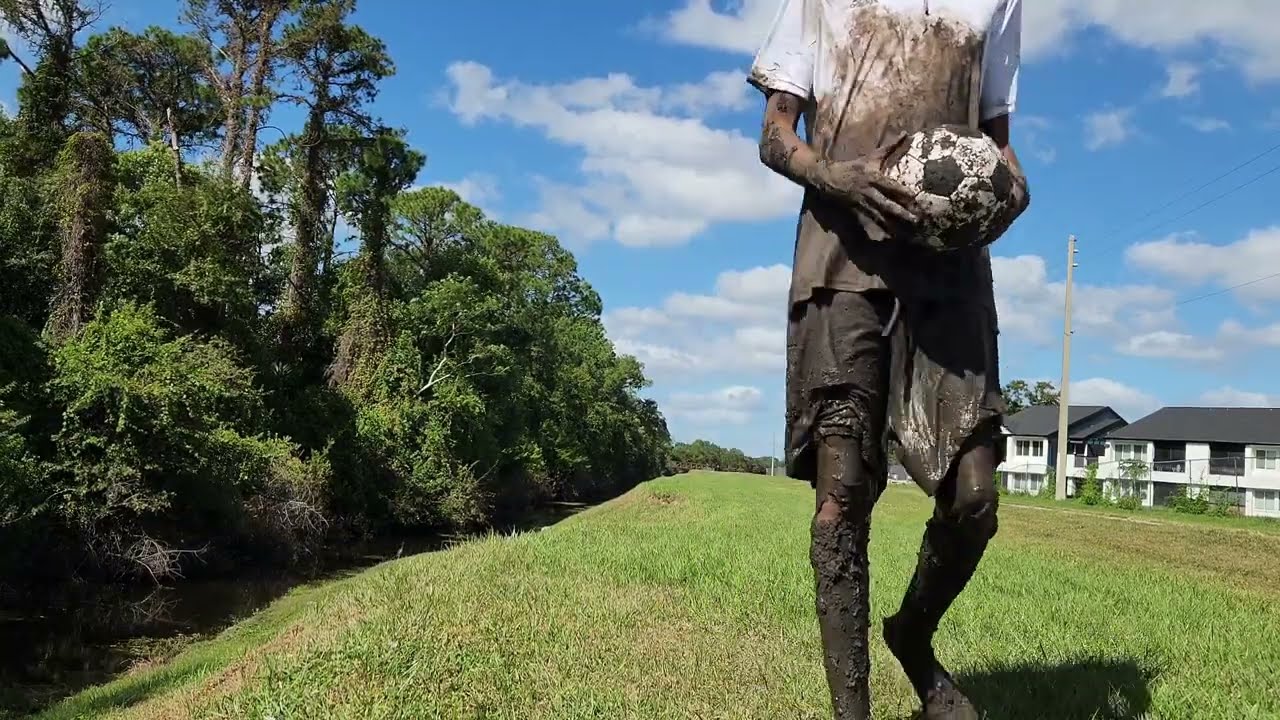 Athlete falls in mud
