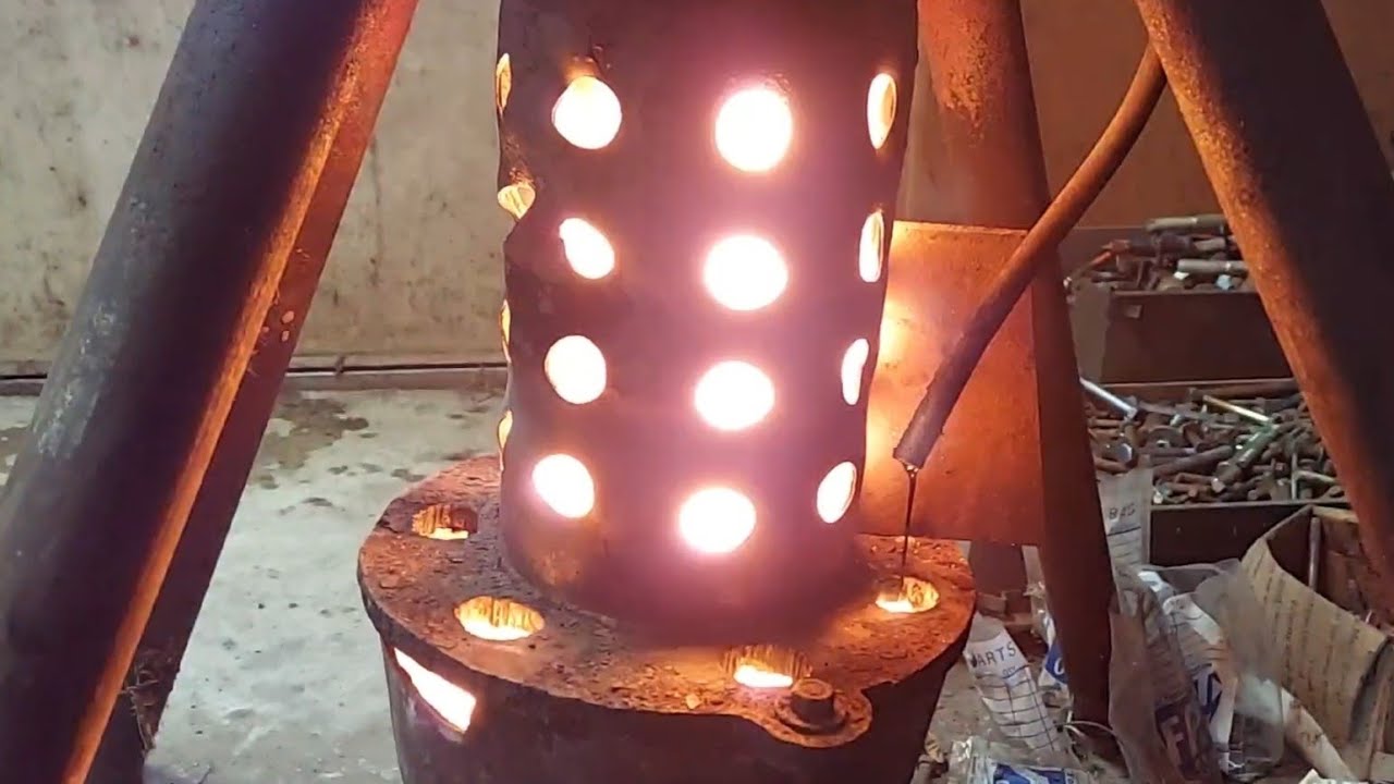 Heating my shop for free with drip feed waste oil burner.