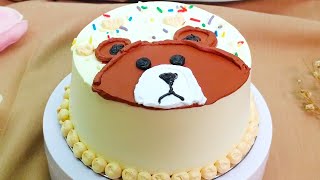 Transforming A Plain Cake Sad Brown Bear On A Light Yellow Cream Background Decorating Tutorial