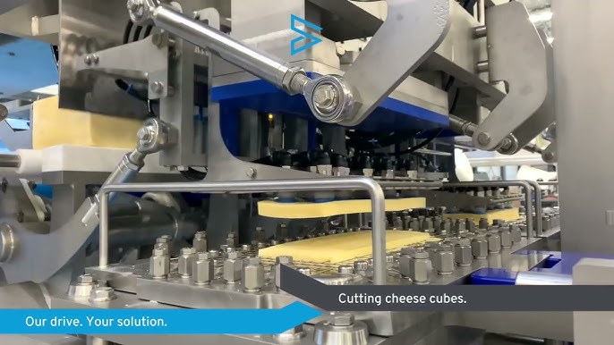 FEI700 2-Way 40# Block Cheese Cutter, The FEI700 is a semi-automatic cheese  cutting machine designed to reduce 40# blocks using two, cross-directional,  cuts. A self-contained hydraulic unit