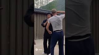 Bruce Lee teaching to Steve McQueen