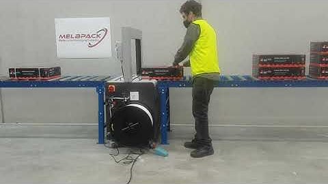 Automatic box strapping machine