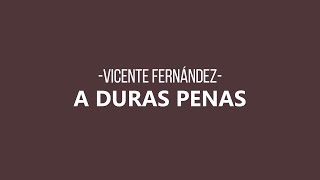 Video thumbnail of "Vicente Fernández - A Duras Penas (Letra/Lyrics)"