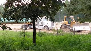 18 wheeler hauling 24 pipe getting stuck in our pasture
