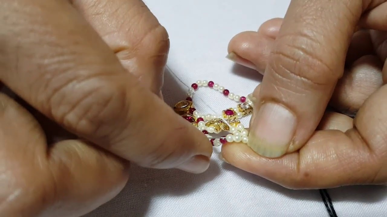 Thakorji's hira, moti, manek malaji