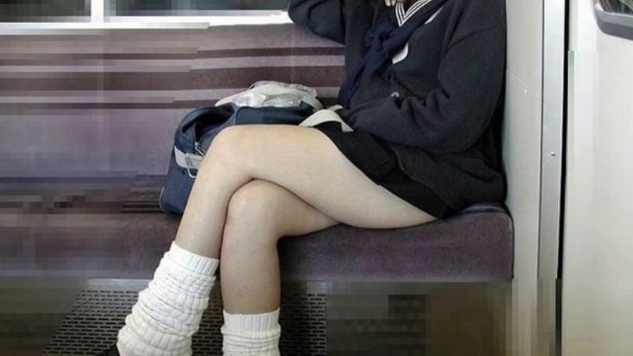 Asian girl wearing a skirt in train meme song