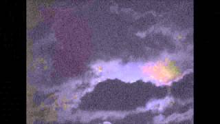 Moon Hiding Behind The Clouds