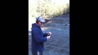 Buddy shoots .22 pistol for first time.  sub-sonic rounds a bad idea