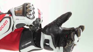 Racing apparel: helmet, gloves and boots for the track