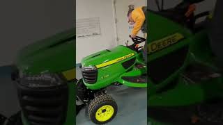 John Deere X738 removal of mower deck, adding tractor shovel, and snowplow.