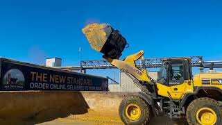Komatsu WA 320- 8 with 4 Yd Ejector Bucket at Ethanol Plant in Ontario