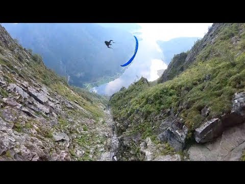 Pair Go Speedflying Through Norwegian Valley