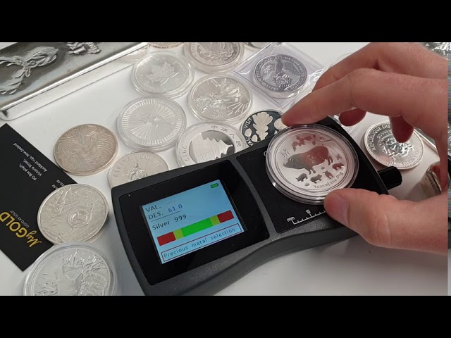Testing two suspect silver coins (aka How to tie a string around a coin!)