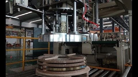 Automatic coil packaging line with coil stacking system