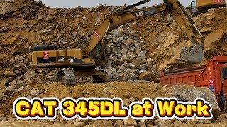 CAT 345DL Mining Excavator Loading Trucks Non-Stop! Heavy Machinery in an Open Mine Site