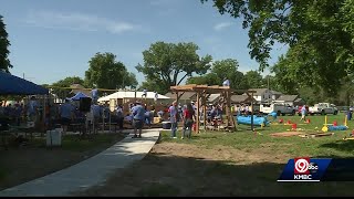 Volunteers help rehab playground named for Pamela Butler
