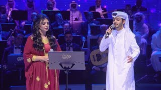 الفنانة أصيل هميم والفنان ناصر الكبيسي في أغنية أمضي بلادي بمشاركة العازفة هالة العمادي