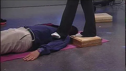 Reporter gets stepped on during massage demo