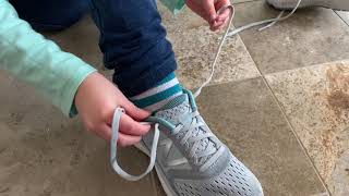 Lavi ties her shoes the new way