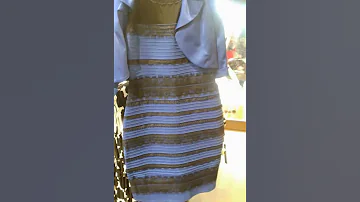 What is the color of the dress?Blue and black or white and gold?