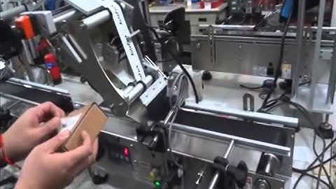 Top label applicator Machine - lay flat, Jars, boxes, Top Labeling Machine  www.autopacker.com