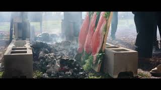 Salmon cooked over open fire in Victoria High Country