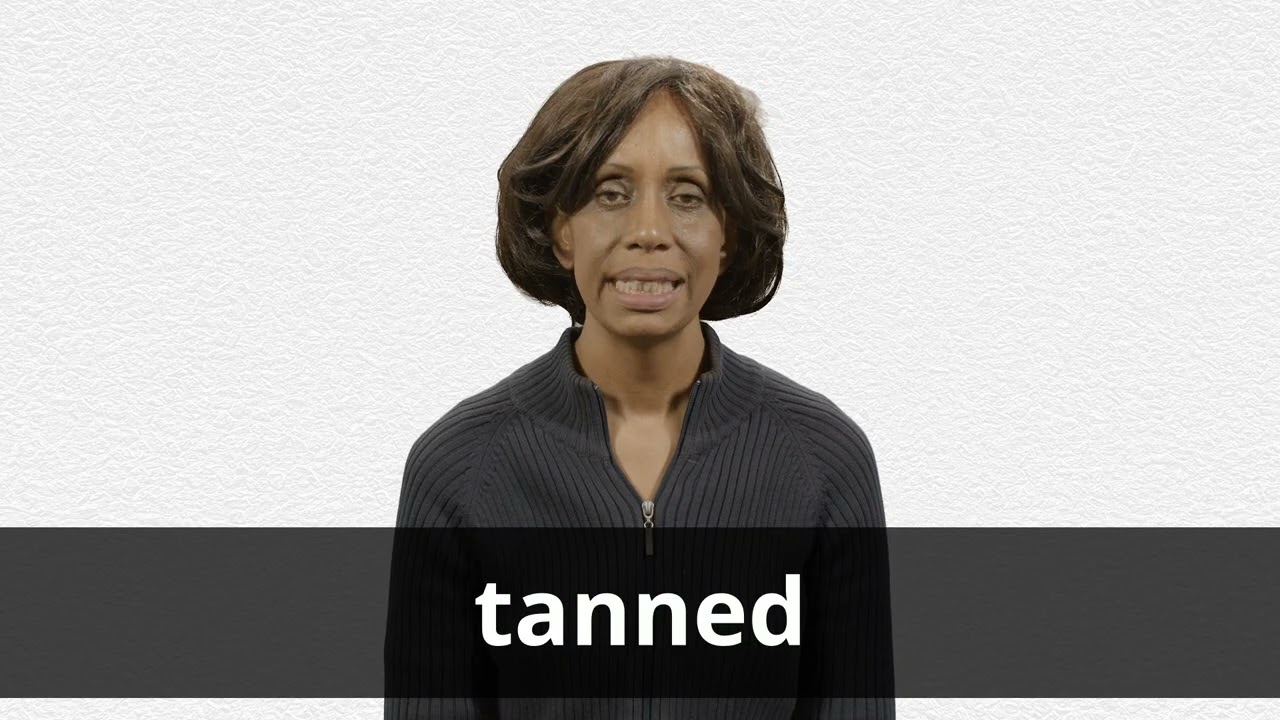 How to pronounce TANNED in American English