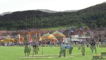 Throwing The Weight Over Bar Highland Games Newburgh Fife Scotland