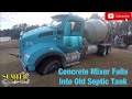 Concrete Mixer falls into old septic tank