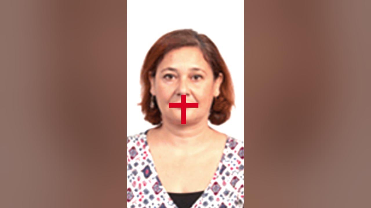 Why you can't smile in passport photos
