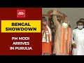 PM Modi Arrives In Purulia For Mega Poll Rally In West Bengal