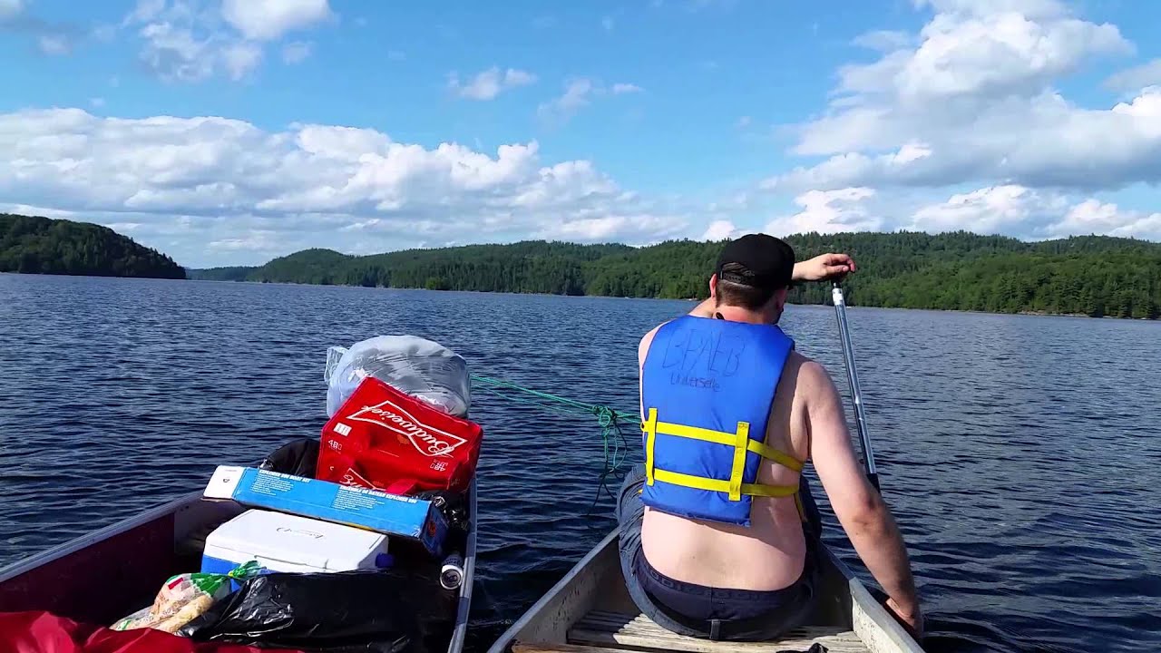 Lac Poisson Blanc canoeing // 2 canoes tied together (canoe camping