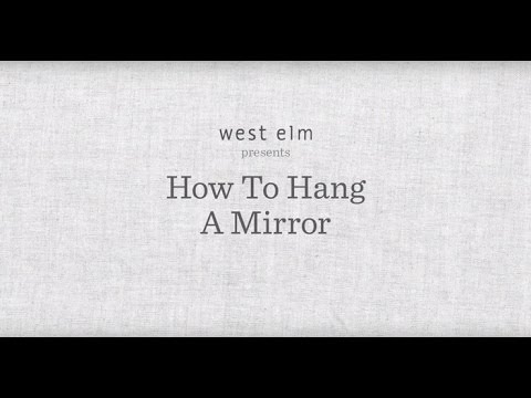 Video: Vägghängare med en spegel i korridoren: huvudelementet i interiören i ett litet rum