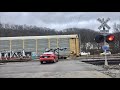 Impatient Driver Can't Wait For 2 Trains To Pass At 4 Track RR Crossing!  Caboose On 1st Train!