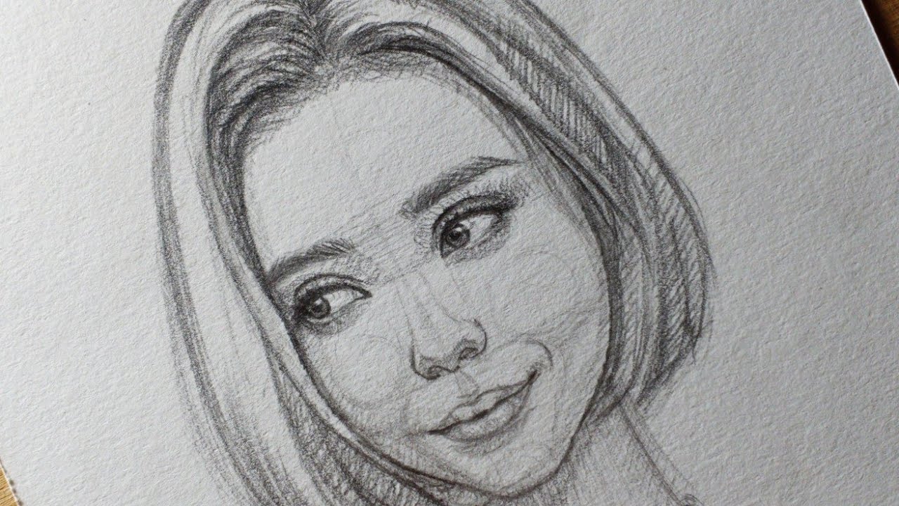 Draw the facial elements in their correct place adding realistic details