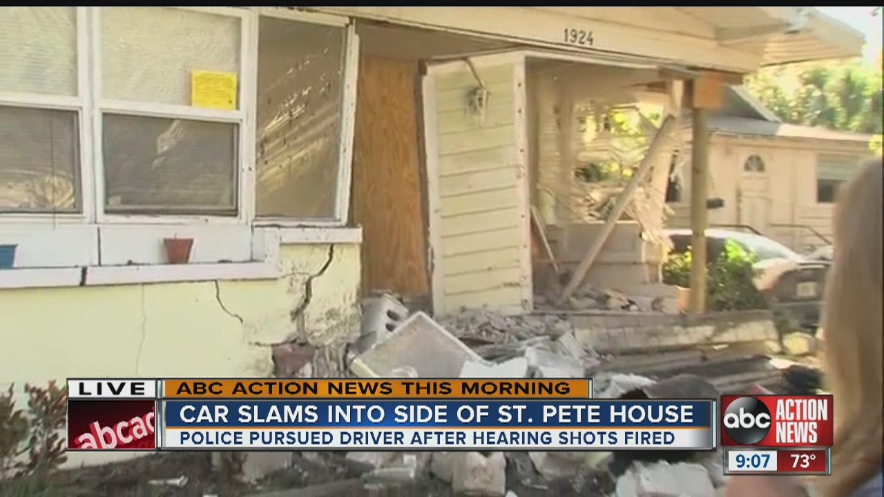 High-speed chase ends with car crashing into St. Petersburg home - YouTube