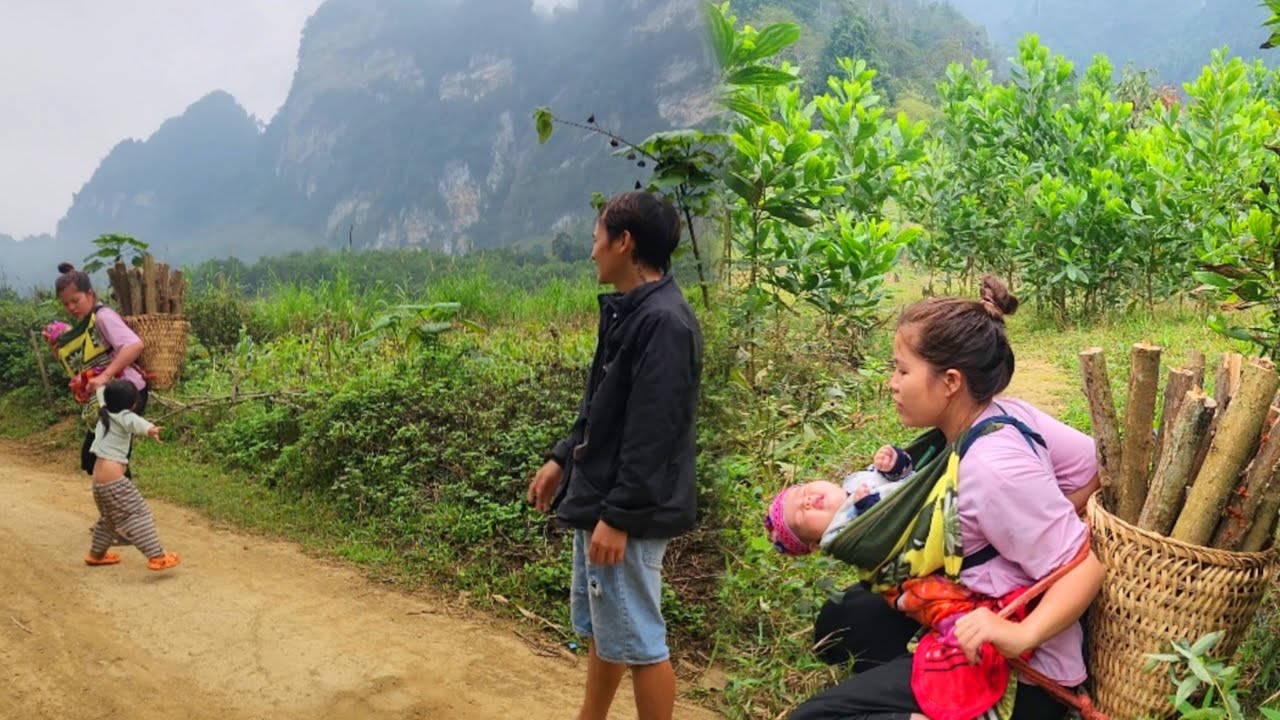 Single mother carrying her child to pick firewood, daughter wants to ...
