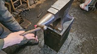 Forging a bottle opener.