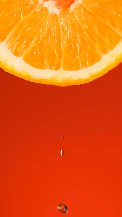 orange slice on an orange background 4k