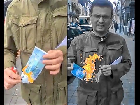 فن ان الش عب يحرق 200 درهم ويعفس على صورة محمد السادس أمام قنصلية مغربية