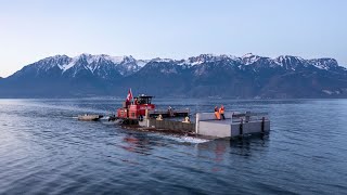SWISS-FLY BORIS BRON - SBB CFF FFS - Eine Bahnbrücke überquert den Genfersee.
