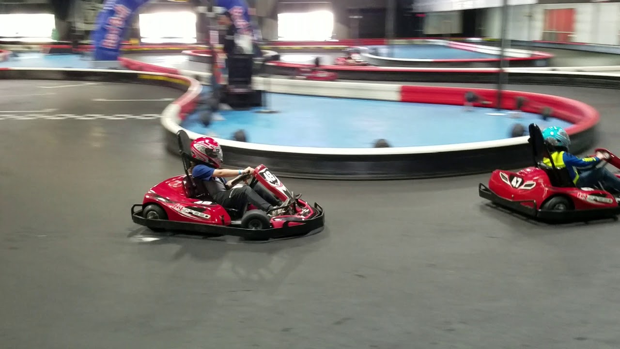 Grandson William racing around indoors at K1 Speed camera iphone 8 plus apk